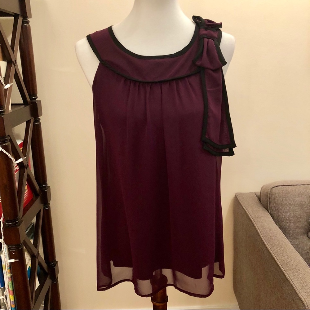 Beautiful purple blouse with bow and keyhole